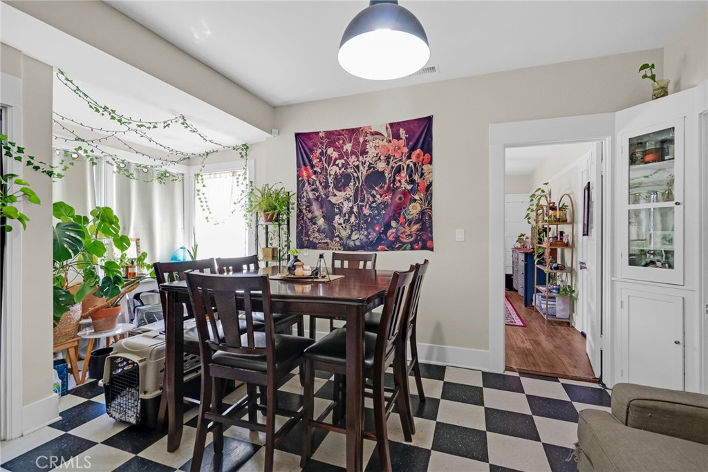 3744 Stoddard Avenue Riverside, CA 92501 - Photo 16 of 29 a view of a dining room with furniture and window