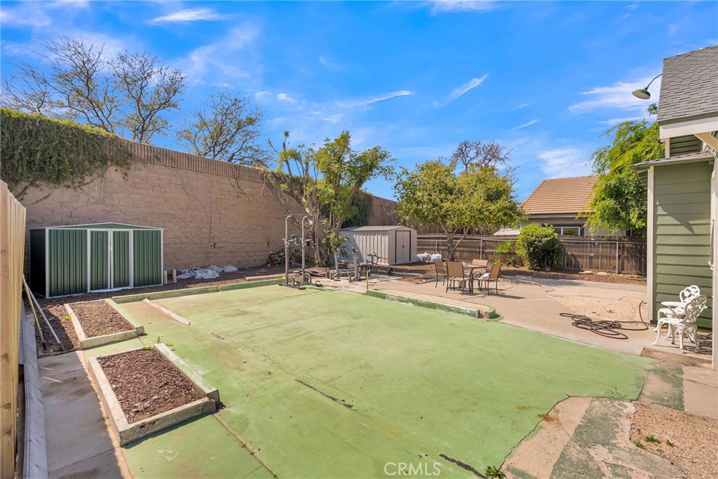 3744 Stoddard Avenue Riverside, CA 92501 - Photo 26 of 29 a view of a swimming pool with a patio