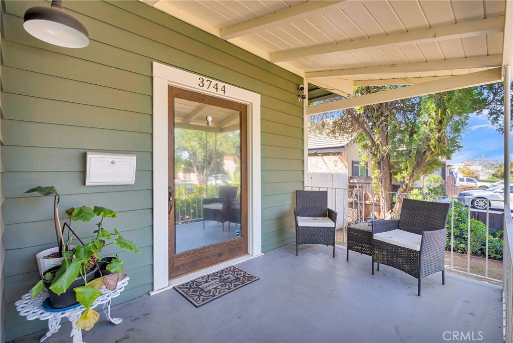 3744 Stoddard Avenue Riverside, CA 92501 - Photo 6 of 29 a outdoor living space with patio furniture and a potted plant