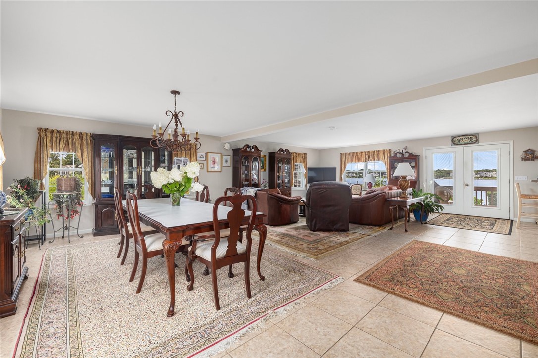 69 East Shore Road Narragansett, RI 02882 - Photo 39 of 42 Wide view photo showing how open the floor plan is and how visible the water view is.