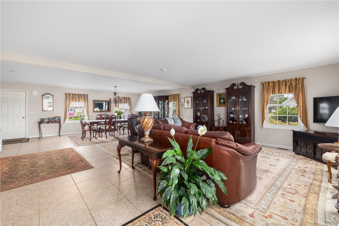 69 East Shore Road Narragansett, RI 02882 - Photo 40 of 42 Huge open floor plan with loads of versatility and carefree neutral tile