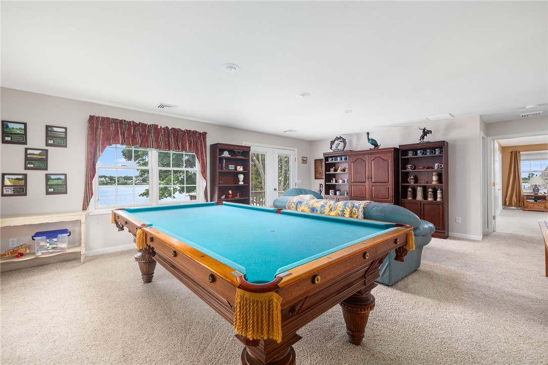 69 East Shore Road Narragansett, RI 02882 - Photo 17 of 42 Enjoy slider to 2nd floor balcony. This photo shows master at the far end.