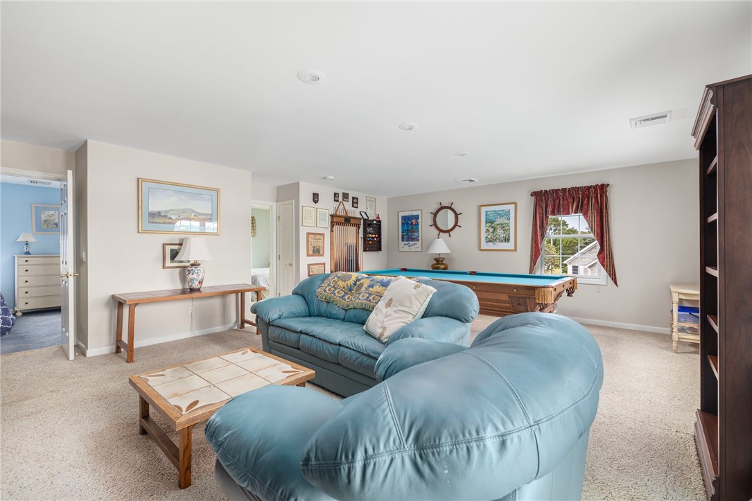 69 East Shore Road Narragansett, RI 02882 - Photo 18 of 42 Off the family room are two bedrooms