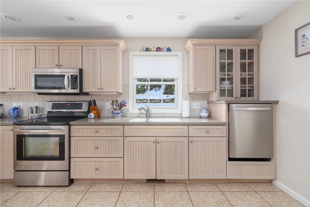 69 East Shore Road Narragansett, RI 02882 - Photo 5 of 42 Cabinets, appliances, countertops all in excellent condition. This home has been lovingly cared for.
