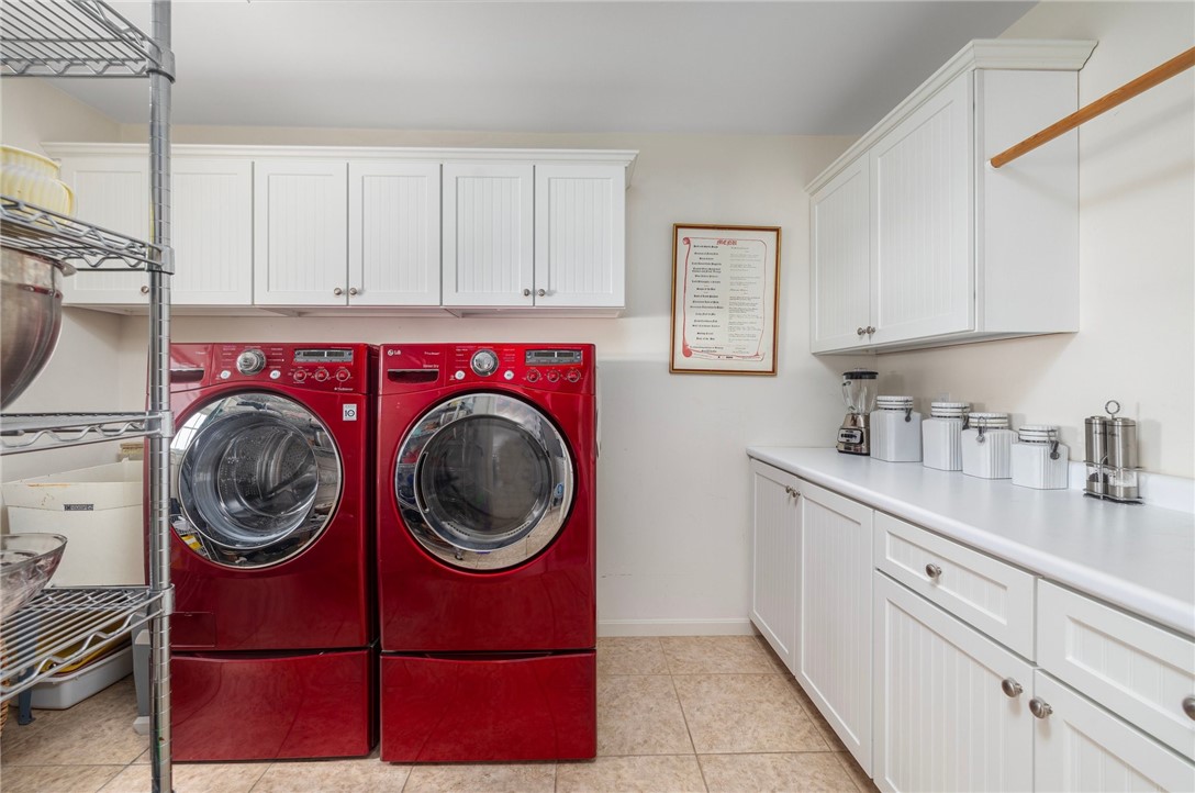 69 East Shore Road Narragansett, RI 02882 - Photo 9 of 42 Oversized pantry is a dream and doubles as first floor laundry room.
