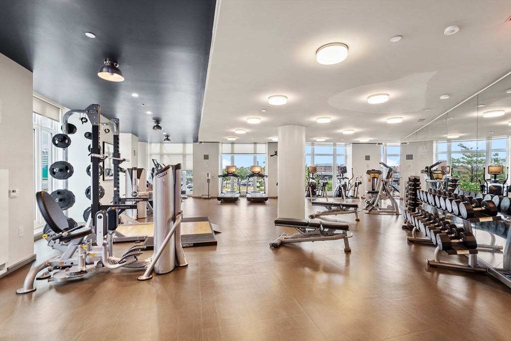 100 Lovejoy Wharf, Unit 5N Boston, MA 02114 - Photo 21 of 23 a view of a room with gym equipment