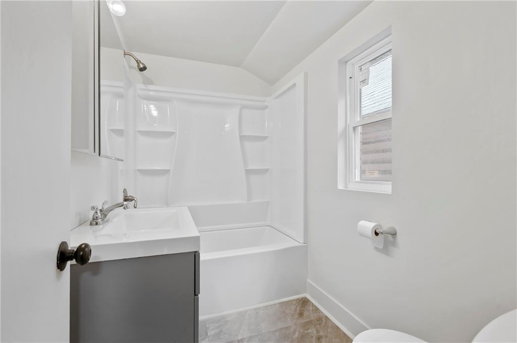 806 Ridge Avenue McKees Rocks, PA 15136 - Photo 21 of 30 a bathroom with a sink mirror vanity and toilet