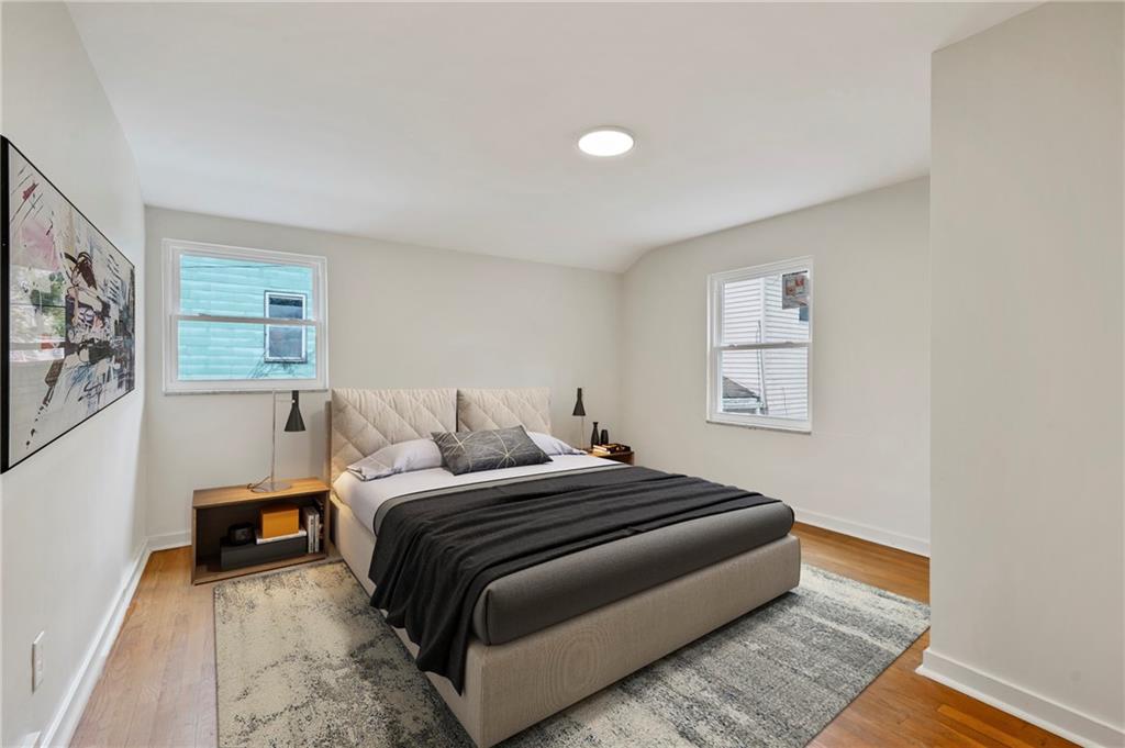 806 Ridge Avenue McKees Rocks, PA 15136 - Photo 22 of 30 a bedroom with a bed and a window