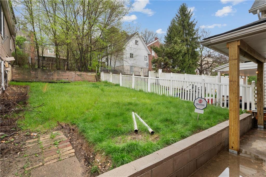 806 Ridge Avenue McKees Rocks, PA 15136 - Photo 29 of 30 a view of a house with a yard and plants