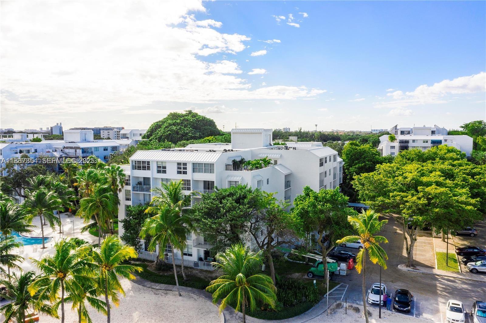 680 Northeast 64th Street, Unit A516 Miami, FL 33138 - Photo 18 of 54 a view of a garden
