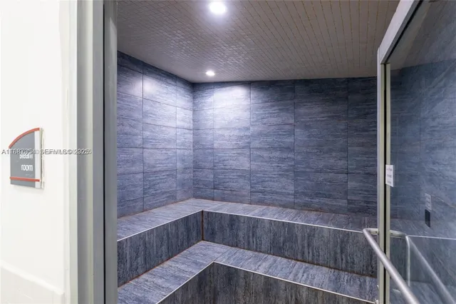 an outdoor space with lots of swings and slides