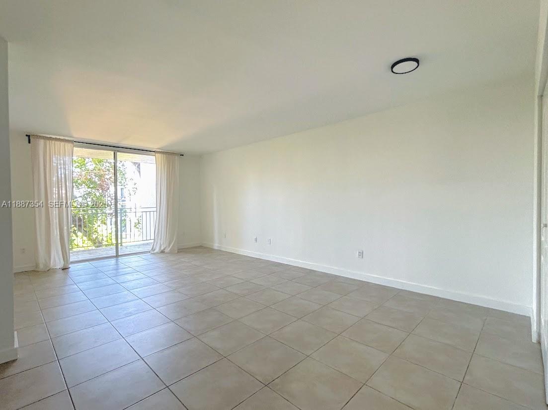680 Northeast 64th Street, Unit A516 Miami, FL 33138 - Photo 4 of 54 wooden floor in a room