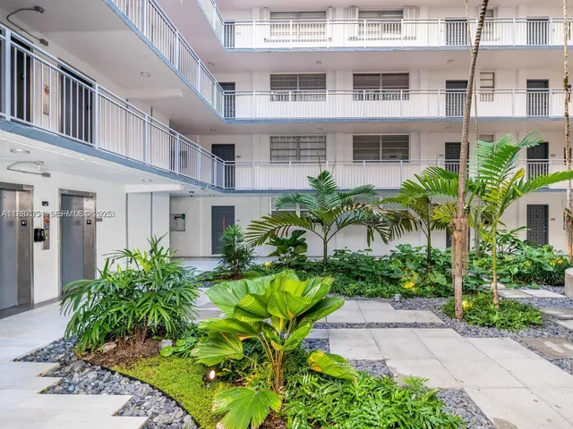 a view of a yard with a patio