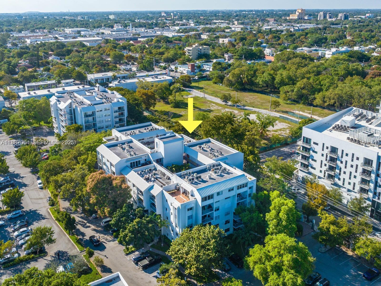 680 Northeast 64th Street, Unit A516 Miami, FL 33138 - Photo 49 of 54 an aerial view of multiple house