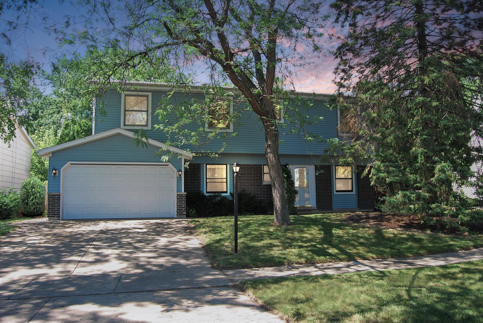 604 Golfview Terrace Buffalo Grove, IL 60089 - Photo 1 of 24 front view of a house with a tree