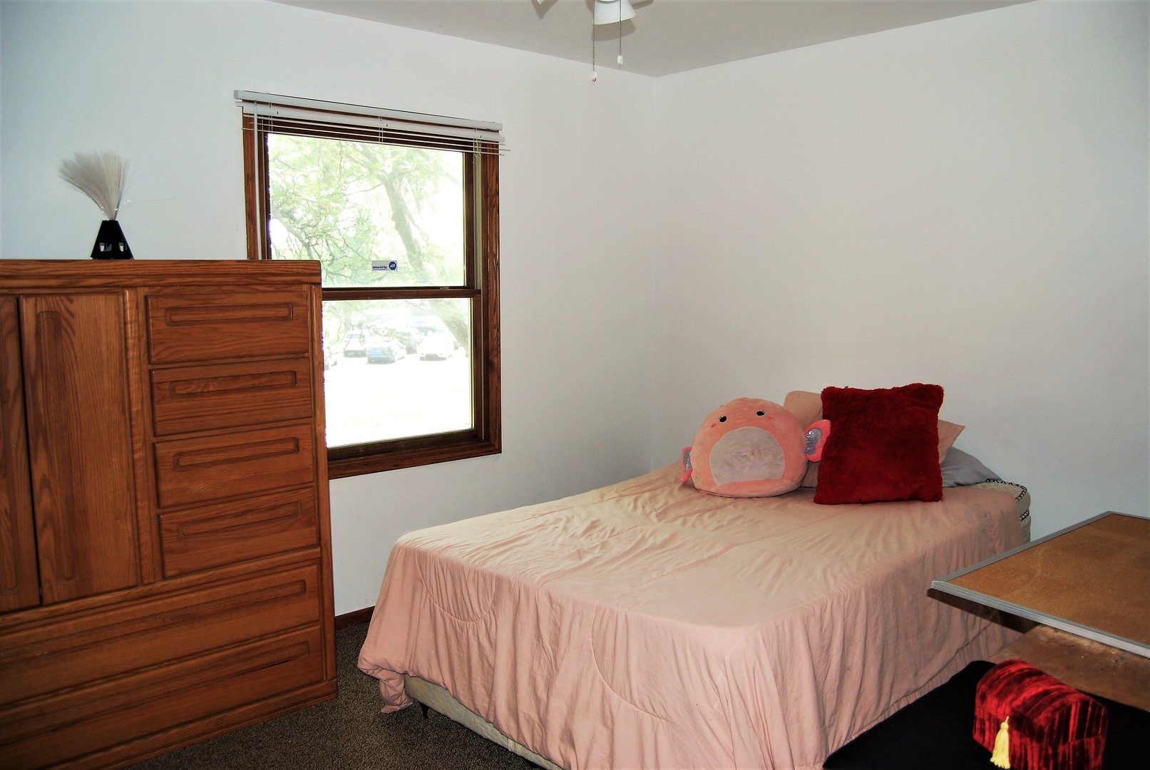 604 Golfview Terrace Buffalo Grove, IL 60089 - Photo 17 of 24 a bedroom with a bed and window