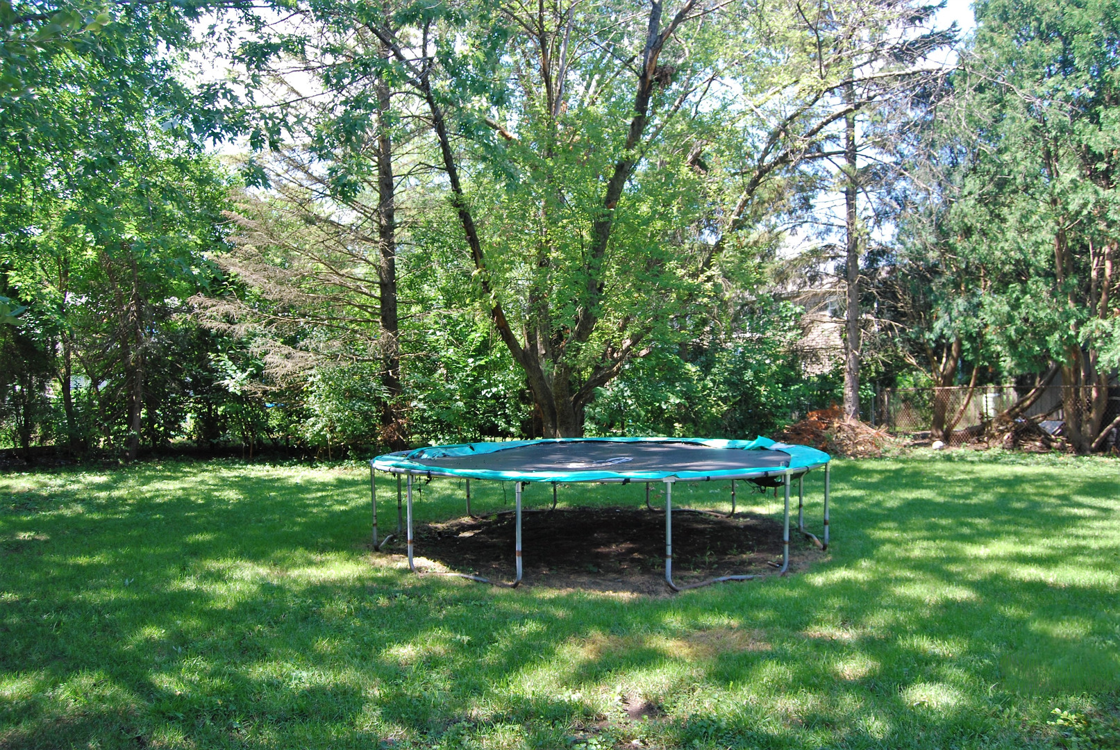 604 Golfview Terrace Buffalo Grove, IL 60089 - Photo 23 of 24 a view of a wooden bench sitting in the garden