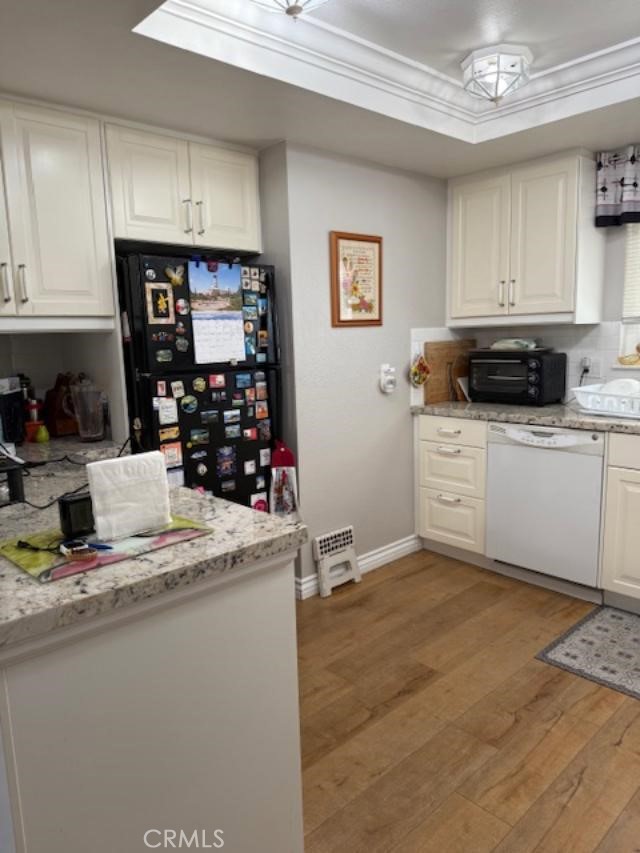 2082 Ronda Granada, Unit D Laguna Woods, CA 92637 - Photo 4 of 36 a kitchen with stainless steel appliances granite countertop a sink stove and cabinets