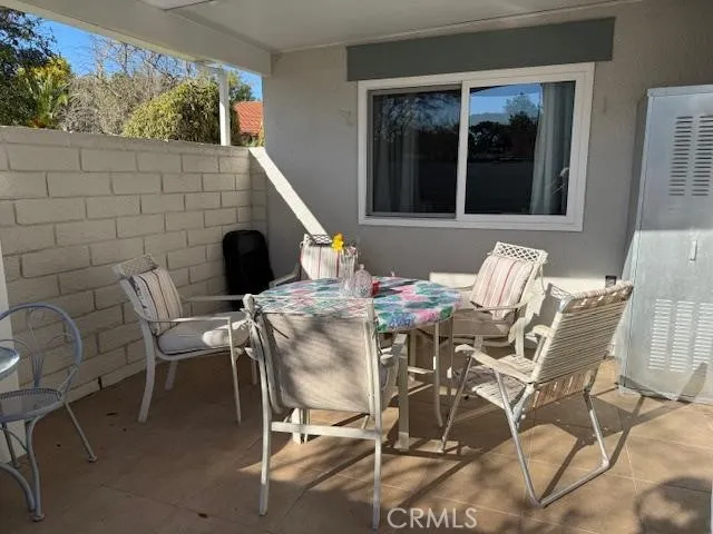 a view of a outdoor seating area with furniture