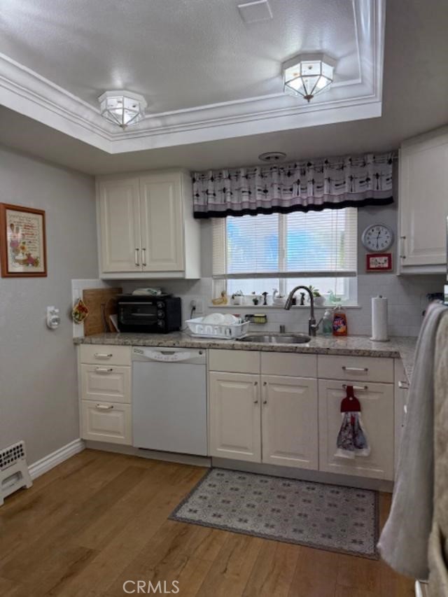 2082 Ronda Granada, Unit D Laguna Woods, CA 92637 - Photo 6 of 36 a kitchen with granite countertop a stove a sink and a cabinets