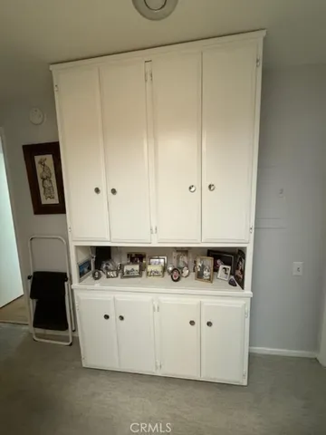 a room with cabinets and window