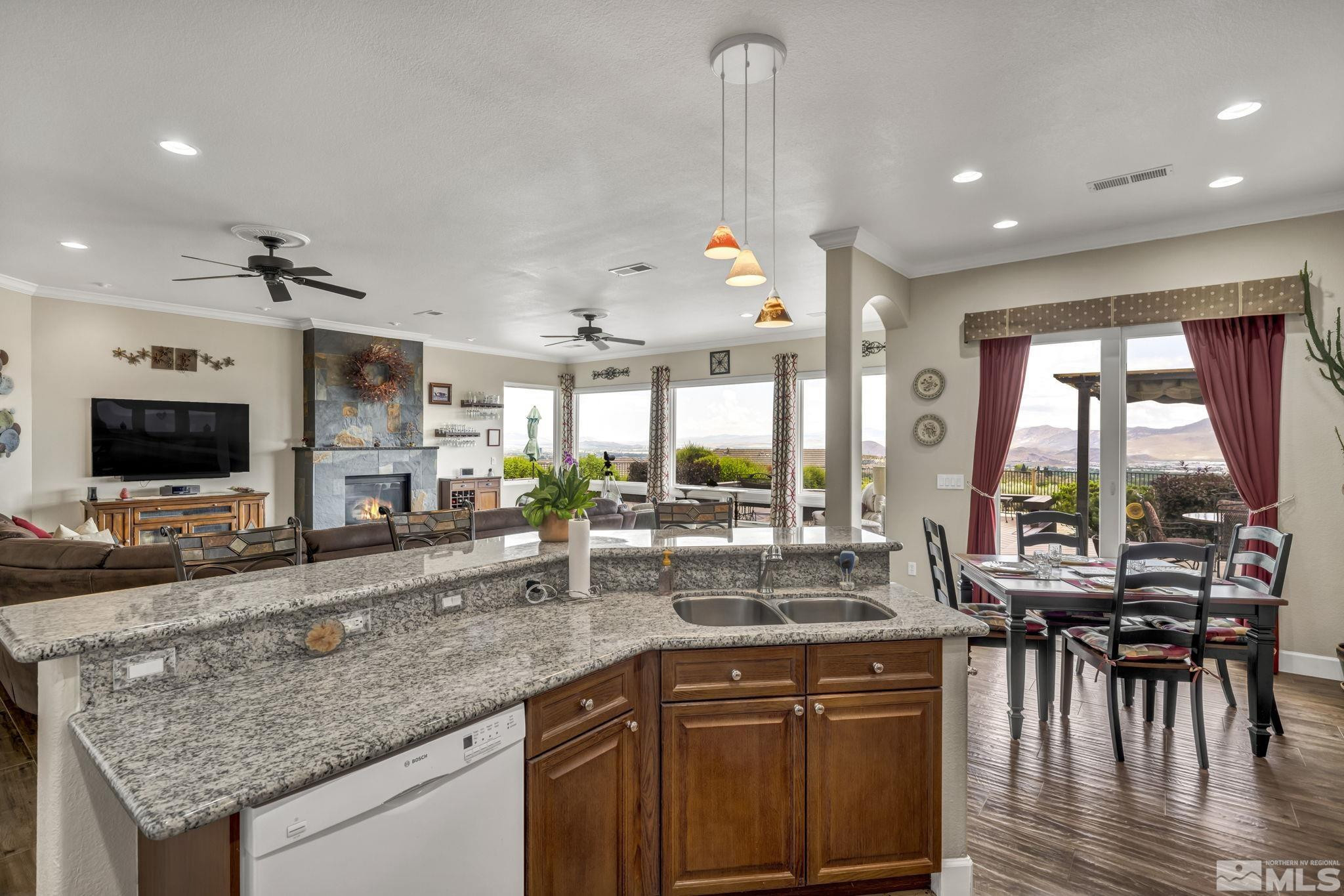 6824 Marble Canyon Road Reno, NV 89511 - Photo 11 of 30 a kitchen with sink and view of living room