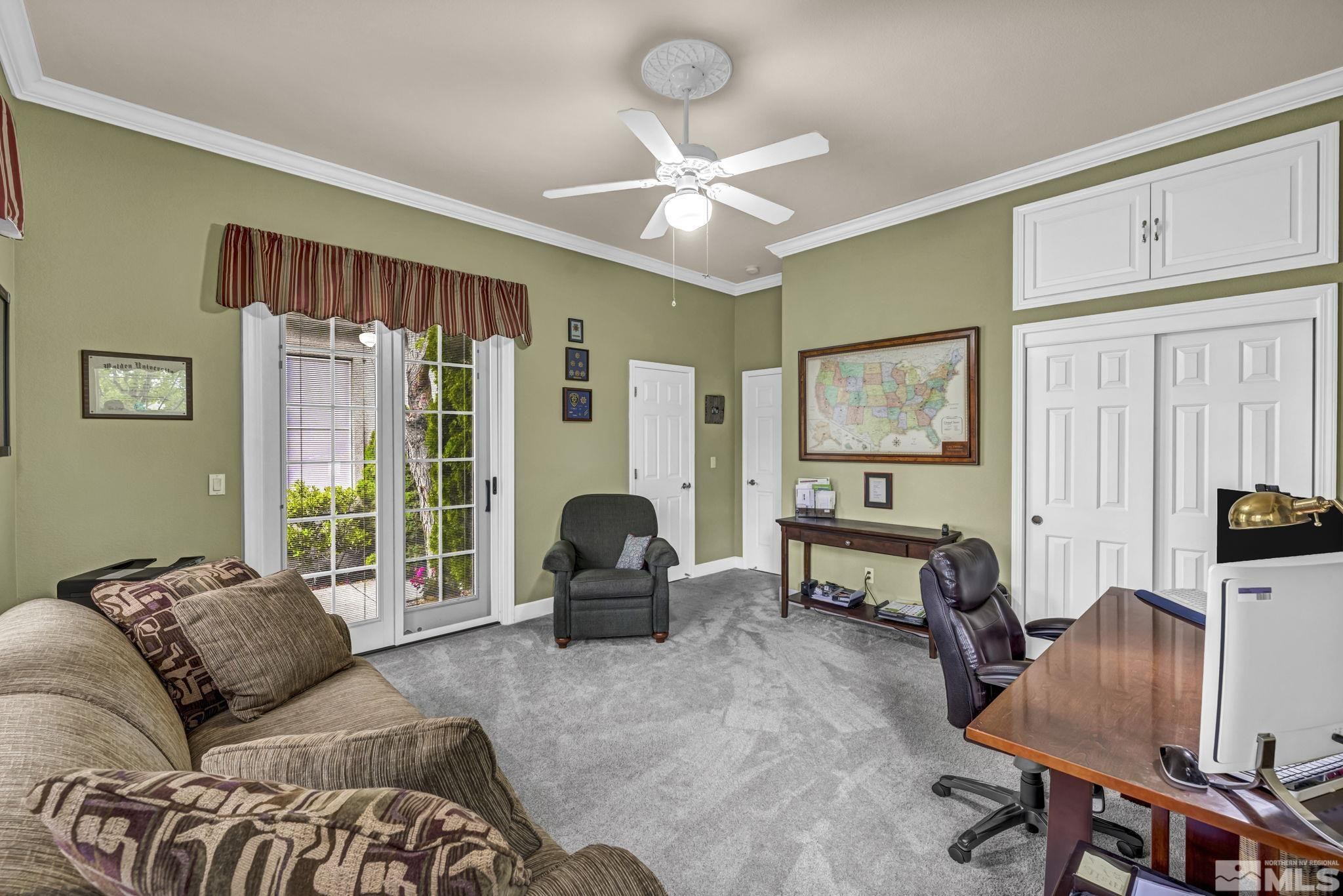 6824 Marble Canyon Road Reno, NV 89511 - Photo 18 of 30 a living room with furniture and a large window