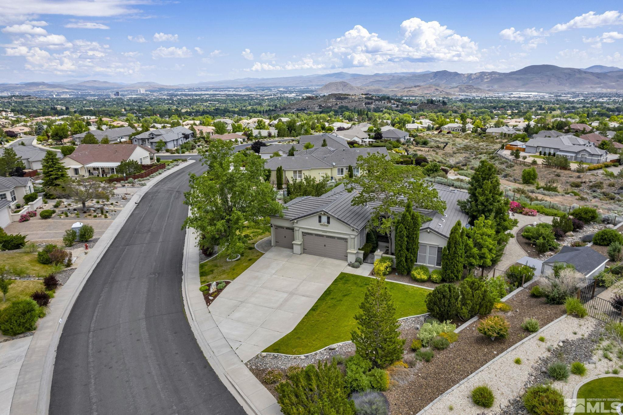 6824 Marble Canyon Road Reno, NV 89511 - Photo 3 of 30 an aerial view of a house with a garden
