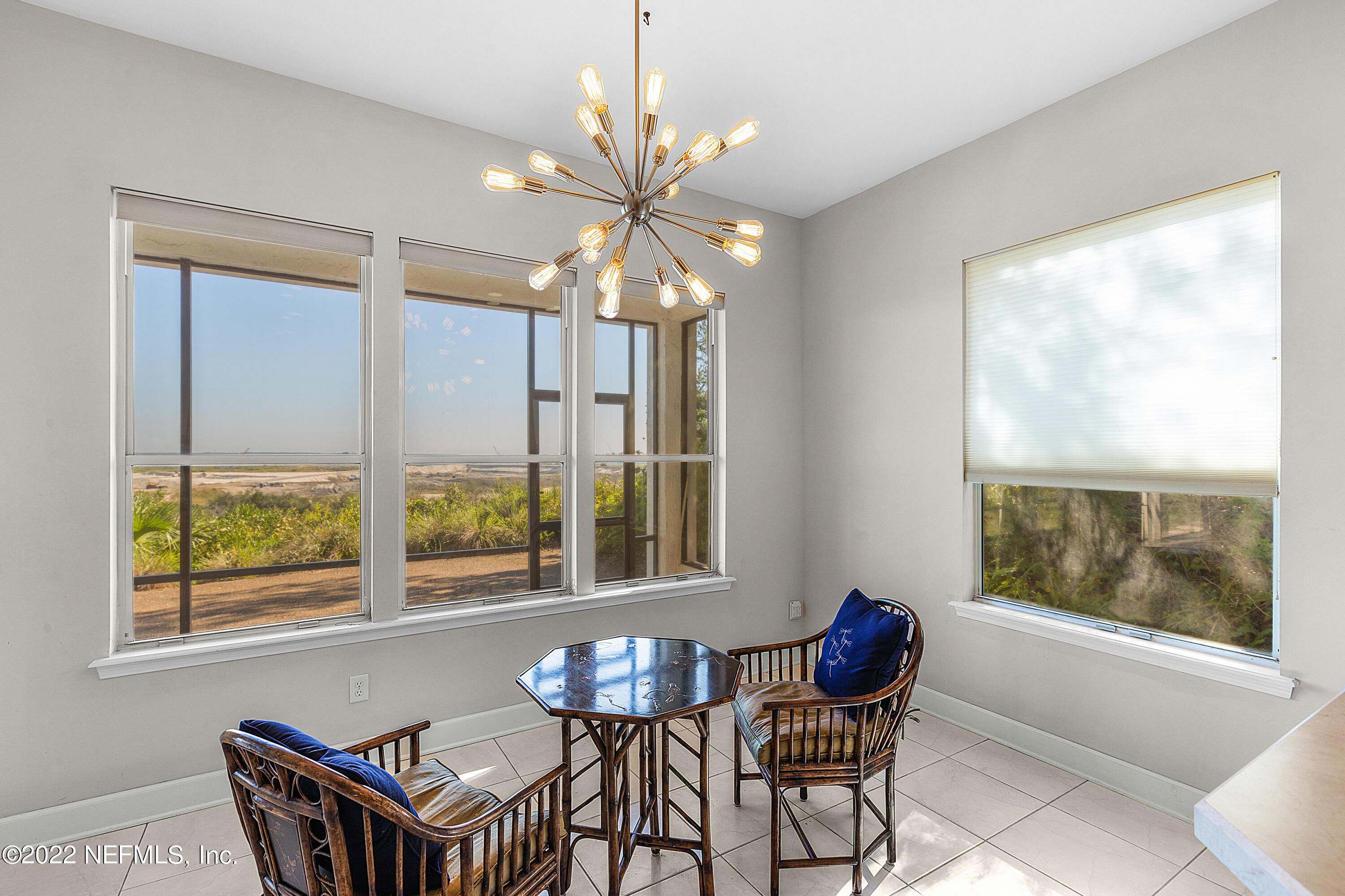 13263 Fort Caroline Road Jacksonville, FL 32225 - Photo 18 of 64 a view of a dining room with furniture and window