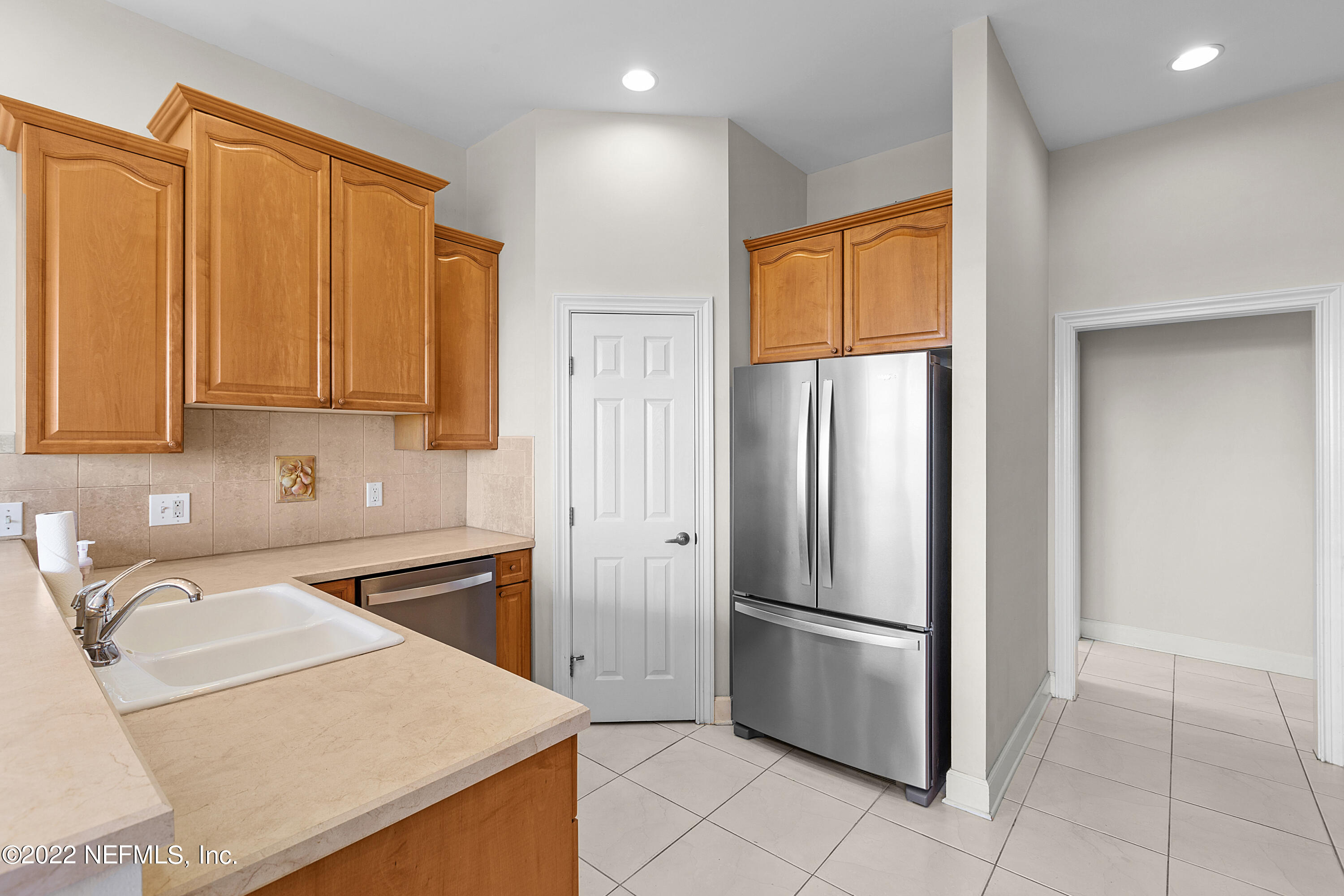 13263 Fort Caroline Road Jacksonville, FL 32225 - Photo 21 of 64 a kitchen with stainless steel appliances granite countertop a refrigerator stove and sink