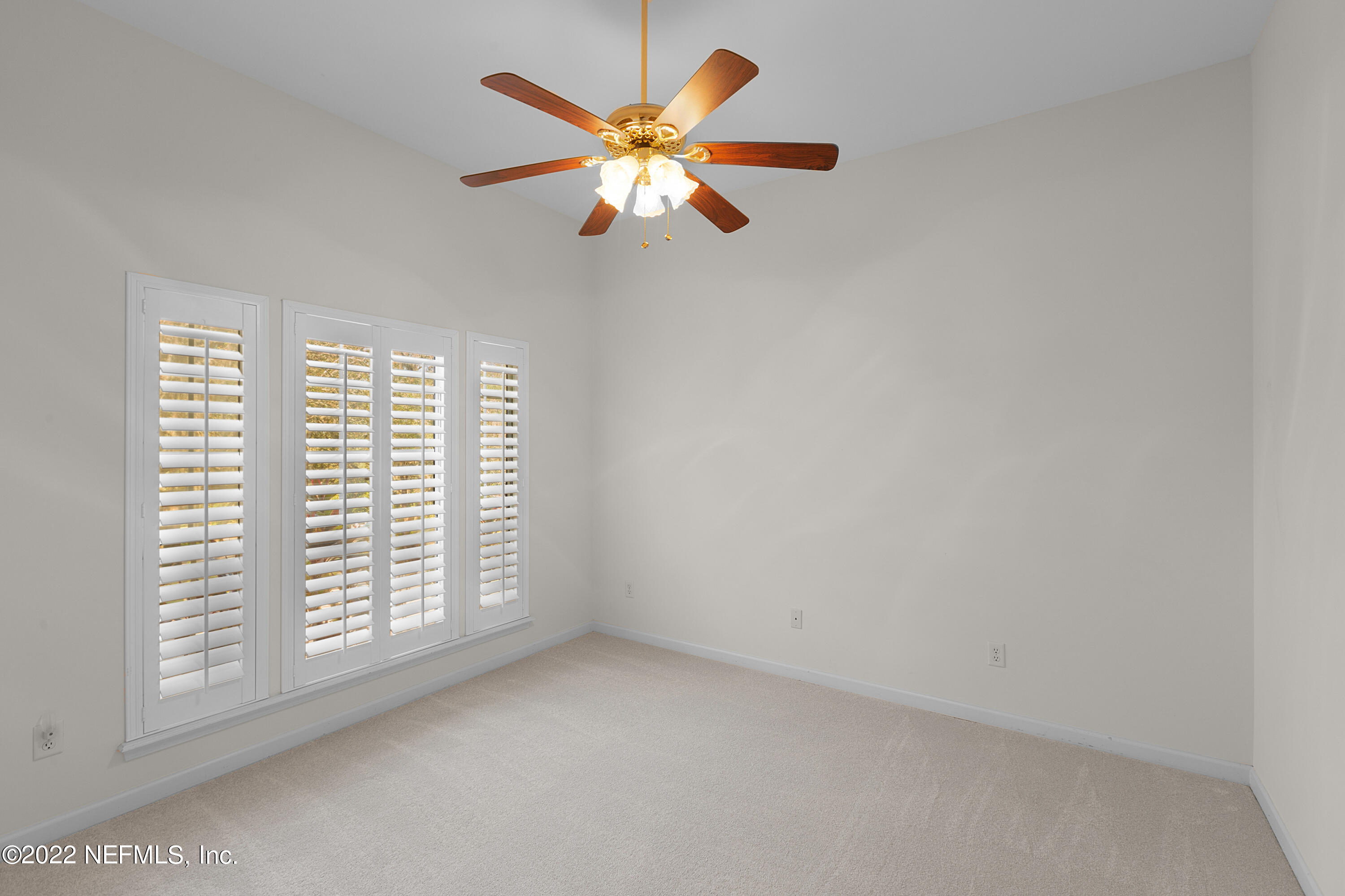 13263 Fort Caroline Road Jacksonville, FL 32225 - Photo 33 of 64 an empty room with windows and fan