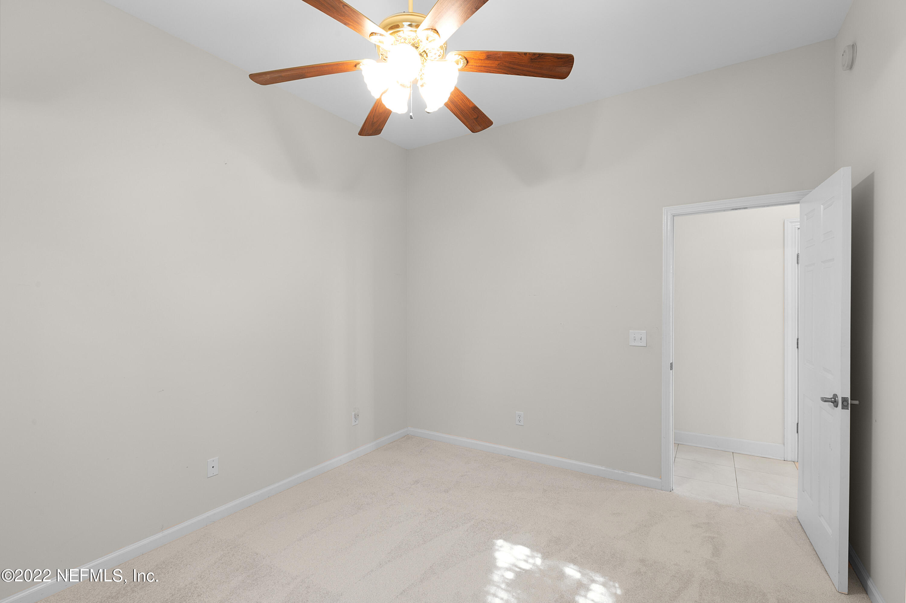 13263 Fort Caroline Road Jacksonville, FL 32225 - Photo 36 of 64 a view of an empty room with a fan