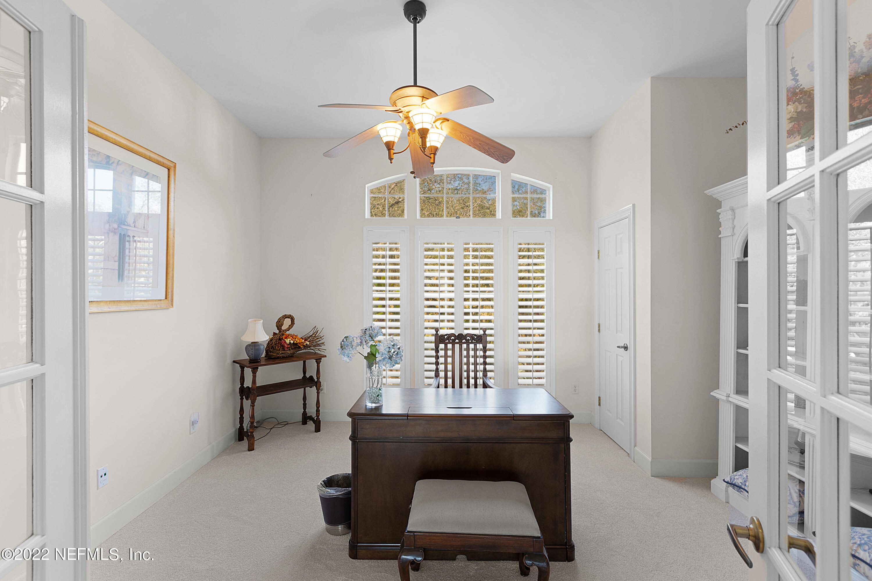 13263 Fort Caroline Road Jacksonville, FL 32225 - Photo 37 of 64 a bedroom with a bed and a window