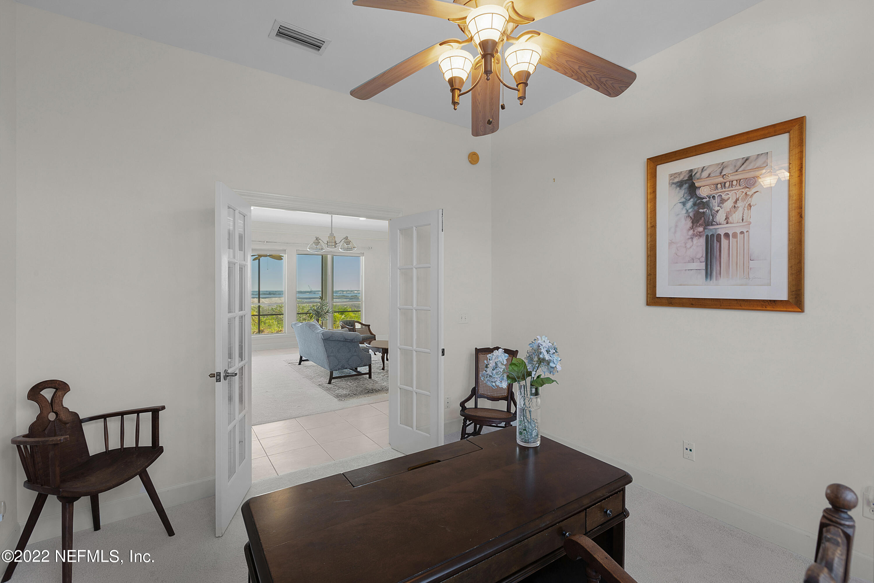 13263 Fort Caroline Road Jacksonville, FL 32225 - Photo 39 of 64 a view of a livingroom with furniture and a potted plant
