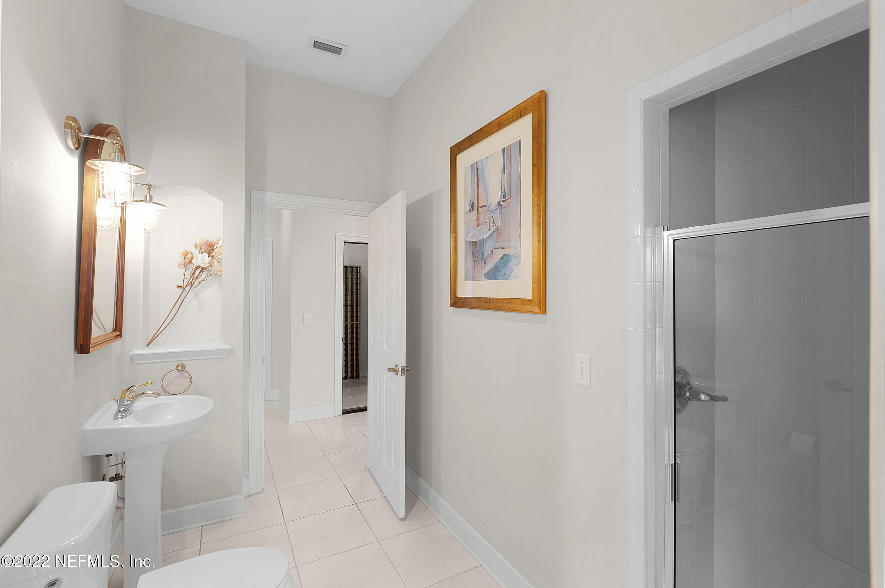 13263 Fort Caroline Road Jacksonville, FL 32225 - Photo 41 of 64 a bathroom with a sink toilet and shower