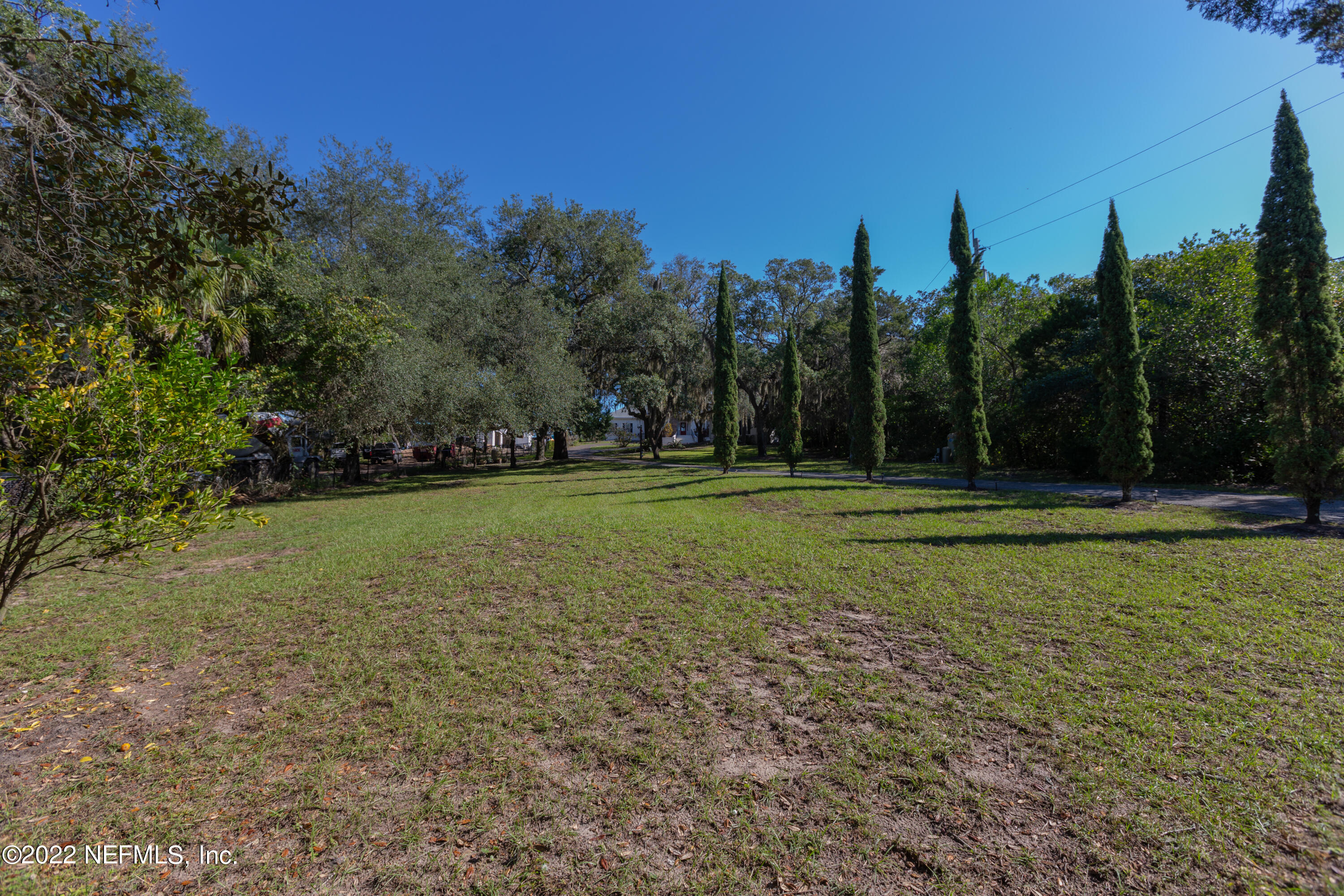 13263 Fort Caroline Road Jacksonville, FL 32225 - Photo 5 of 64 a view of outdoor space with trees all around