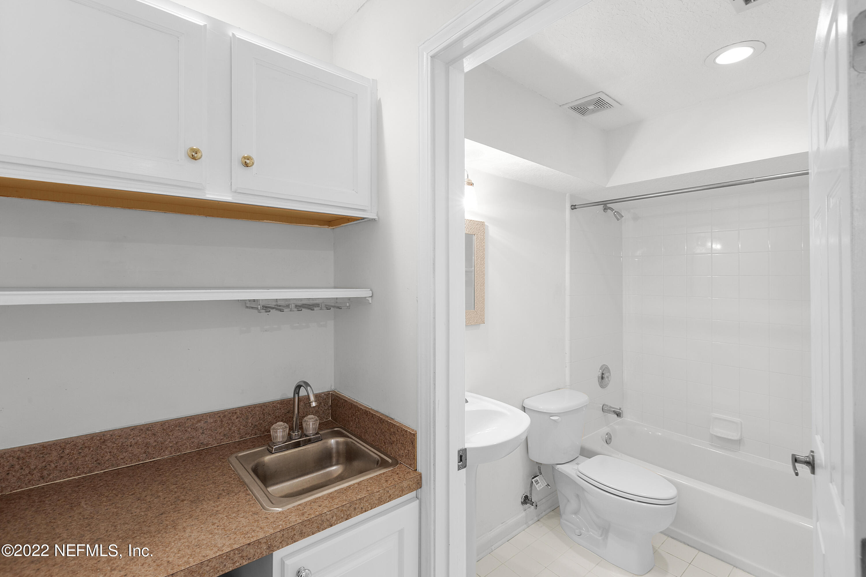 13263 Fort Caroline Road Jacksonville, FL 32225 - Photo 54 of 64 a bathroom with a sink toilet and shower