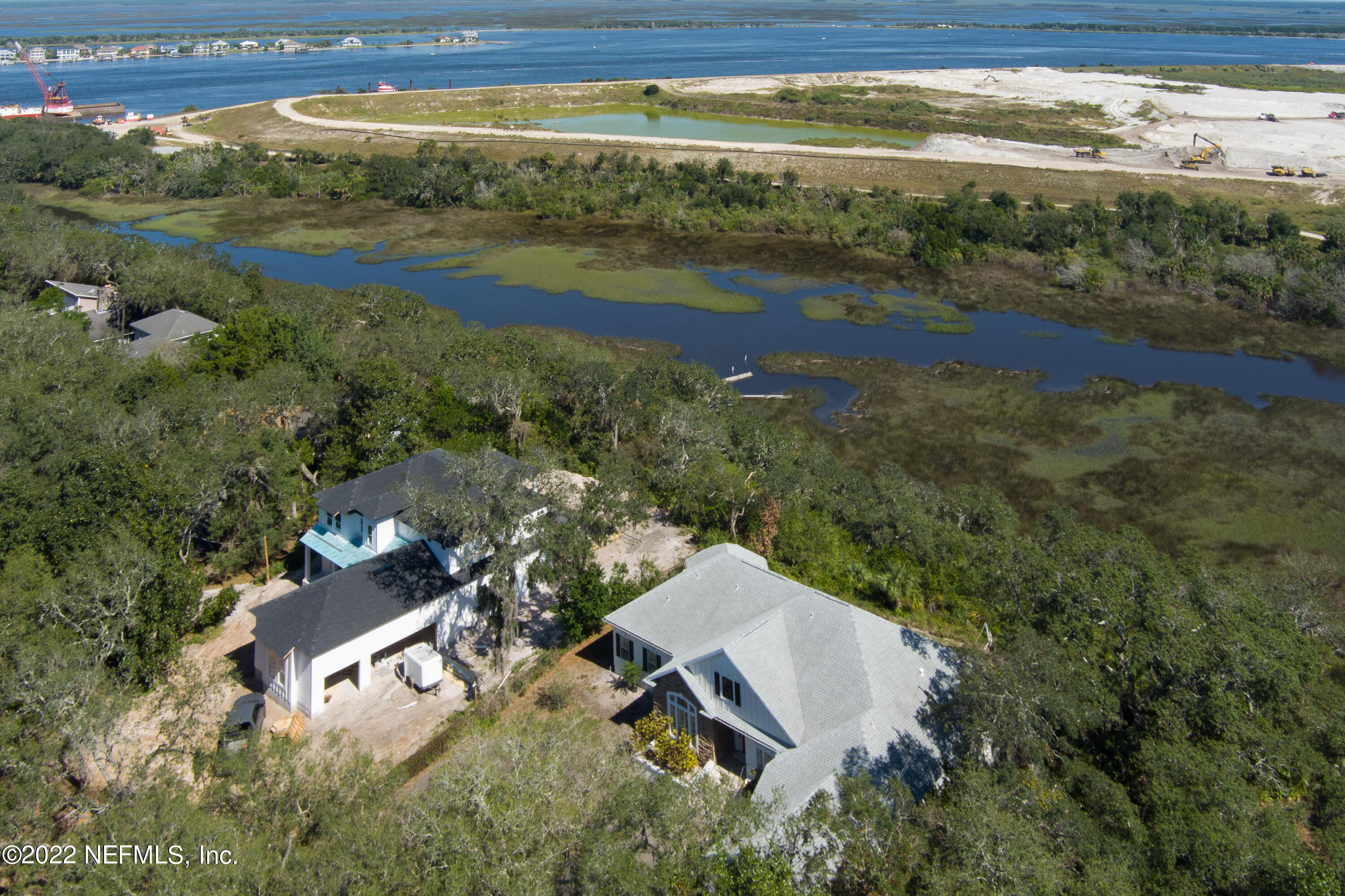 13263 Fort Caroline Road Jacksonville, FL 32225 - Photo 59 of 64 an aerial view of residential houses with outdoor space