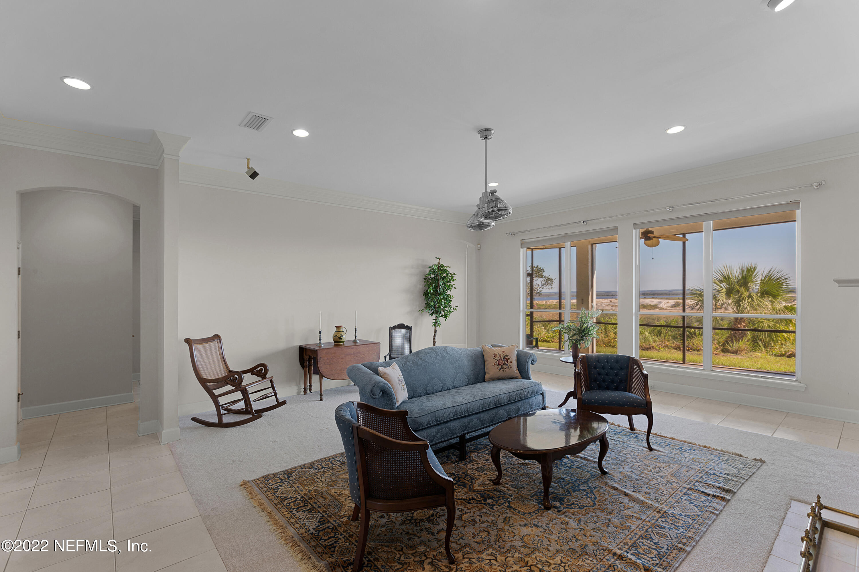 13263 Fort Caroline Road Jacksonville, FL 32225 - Photo 10 of 64 a living room with furniture and a window