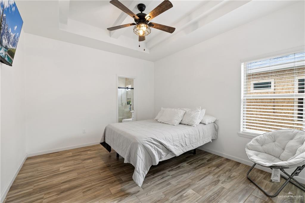 6007 Reymundo Street Edinburg, TX 78542 - Photo 11 of 17 a bedroom with a bed and a chair