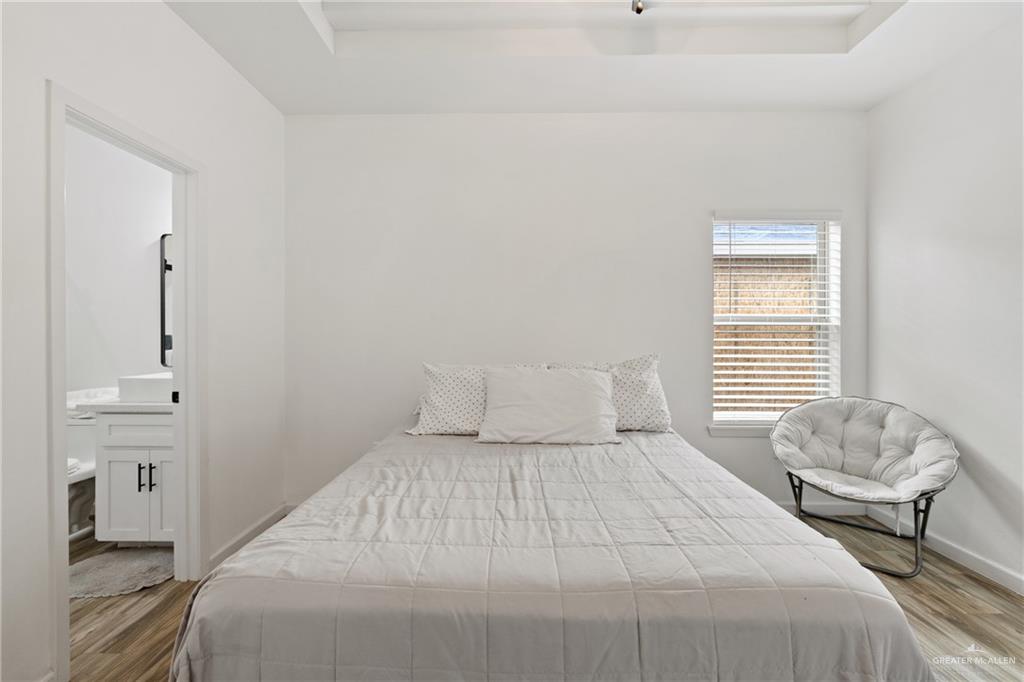 6007 Reymundo Street Edinburg, TX 78542 - Photo 12 of 17 a bedroom with a bed and a window