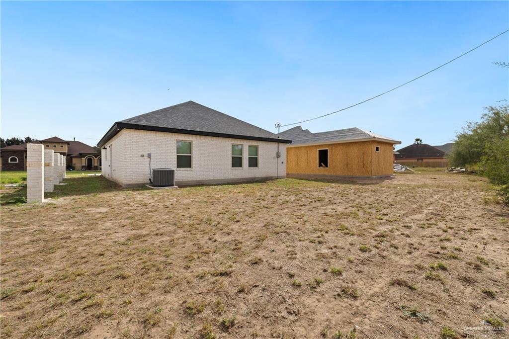6007 Reymundo Street Edinburg, TX 78542 - Photo 16 of 17 a view of a house with a yard