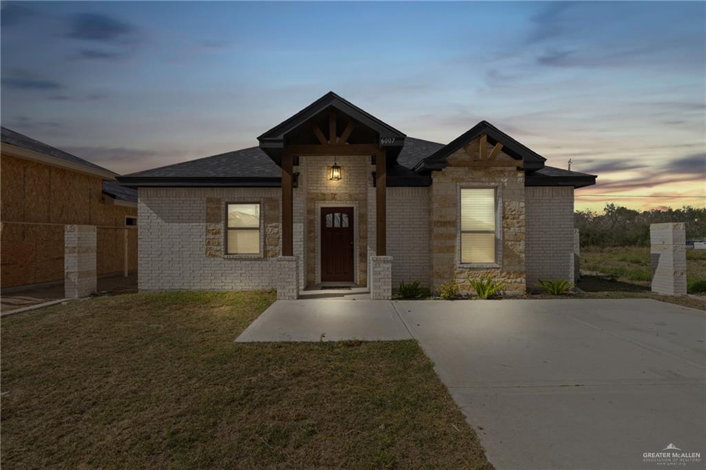 6007 Reymundo Street Edinburg, TX 78542 - Photo 2 of 17 a front view of a house with yard