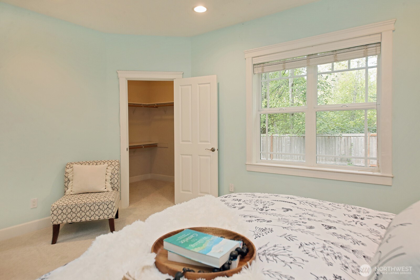 1821 Watkins Road Freeland, WA 98249 - Photo 14 of 28 a bedroom with a bed and a chair