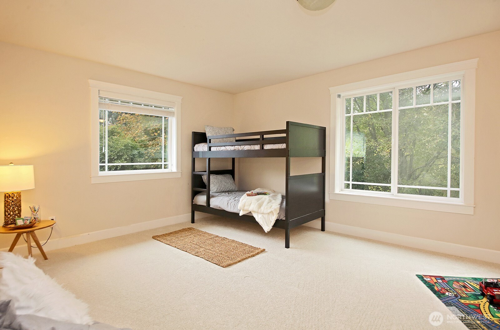 1821 Watkins Road Freeland, WA 98249 - Photo 19 of 28 a bedroom with a bed and a window