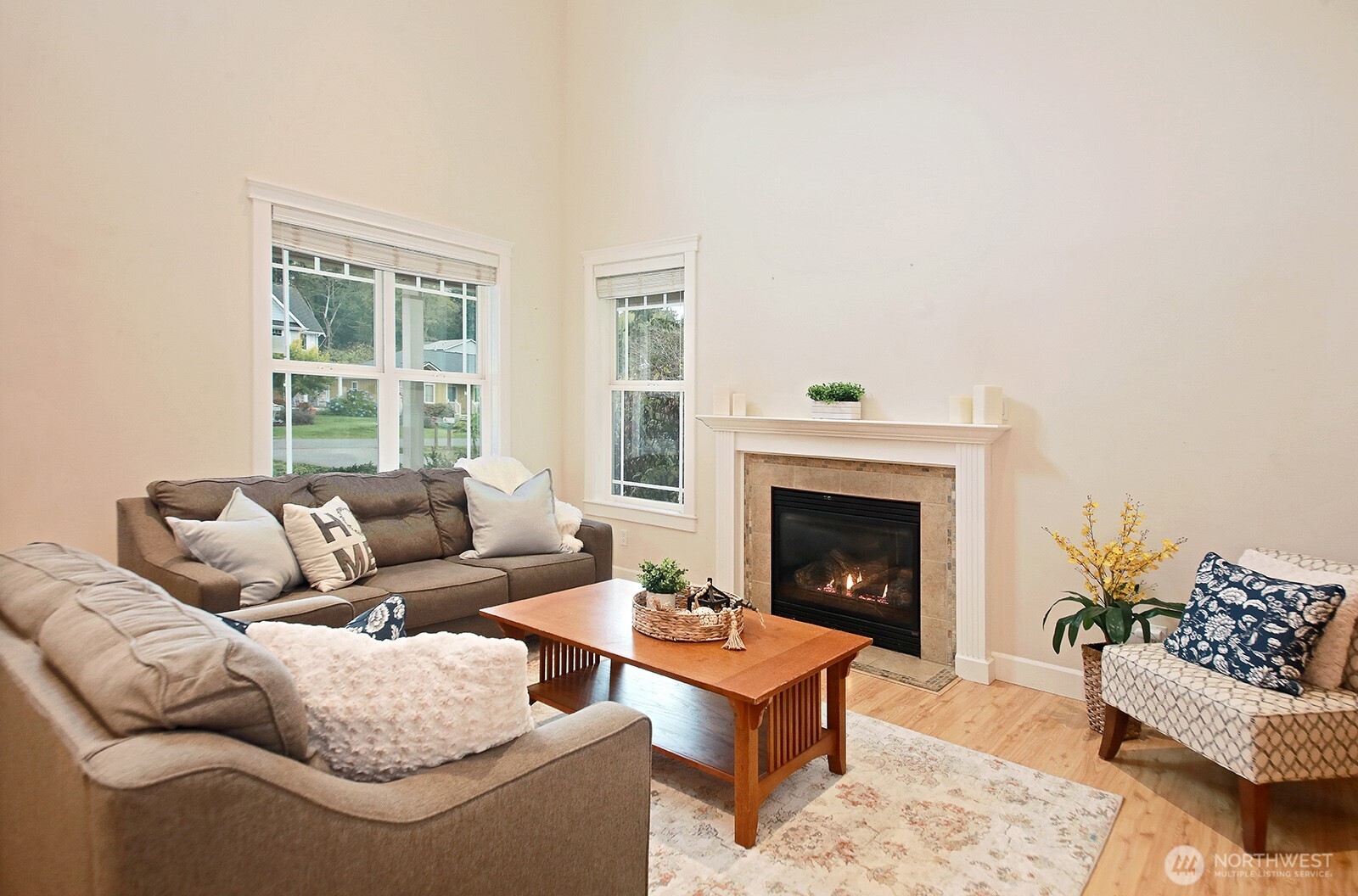 1821 Watkins Road Freeland, WA 98249 - Photo 5 of 28 a living room with furniture and a fireplace