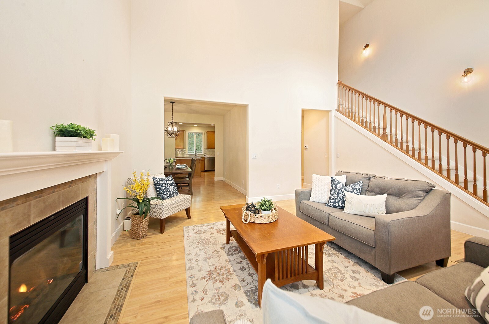 1821 Watkins Road Freeland, WA 98249 - Photo 6 of 28 a living room with furniture and a fireplace