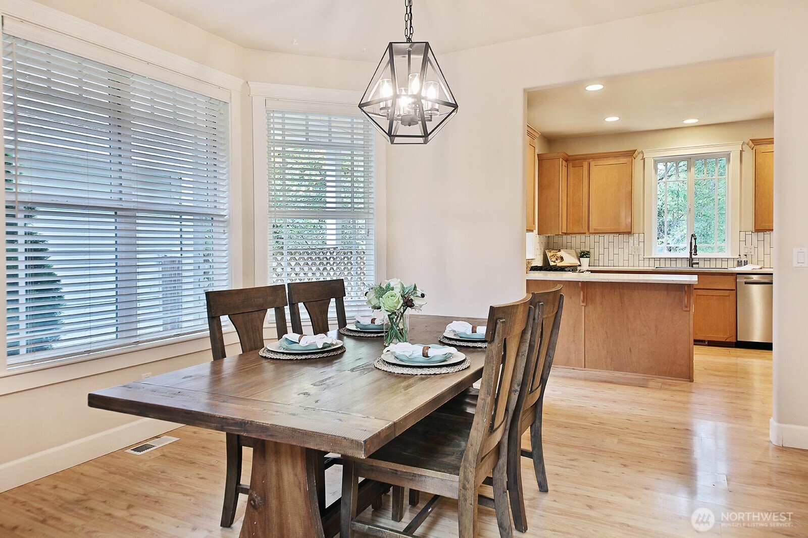 1821 Watkins Road Freeland, WA 98249 - Photo 7 of 28 a view of a dining room with furniture window and wooden floor