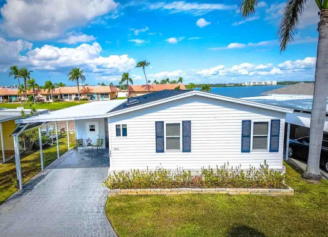 a view of a terrace with furniture and a potted plant