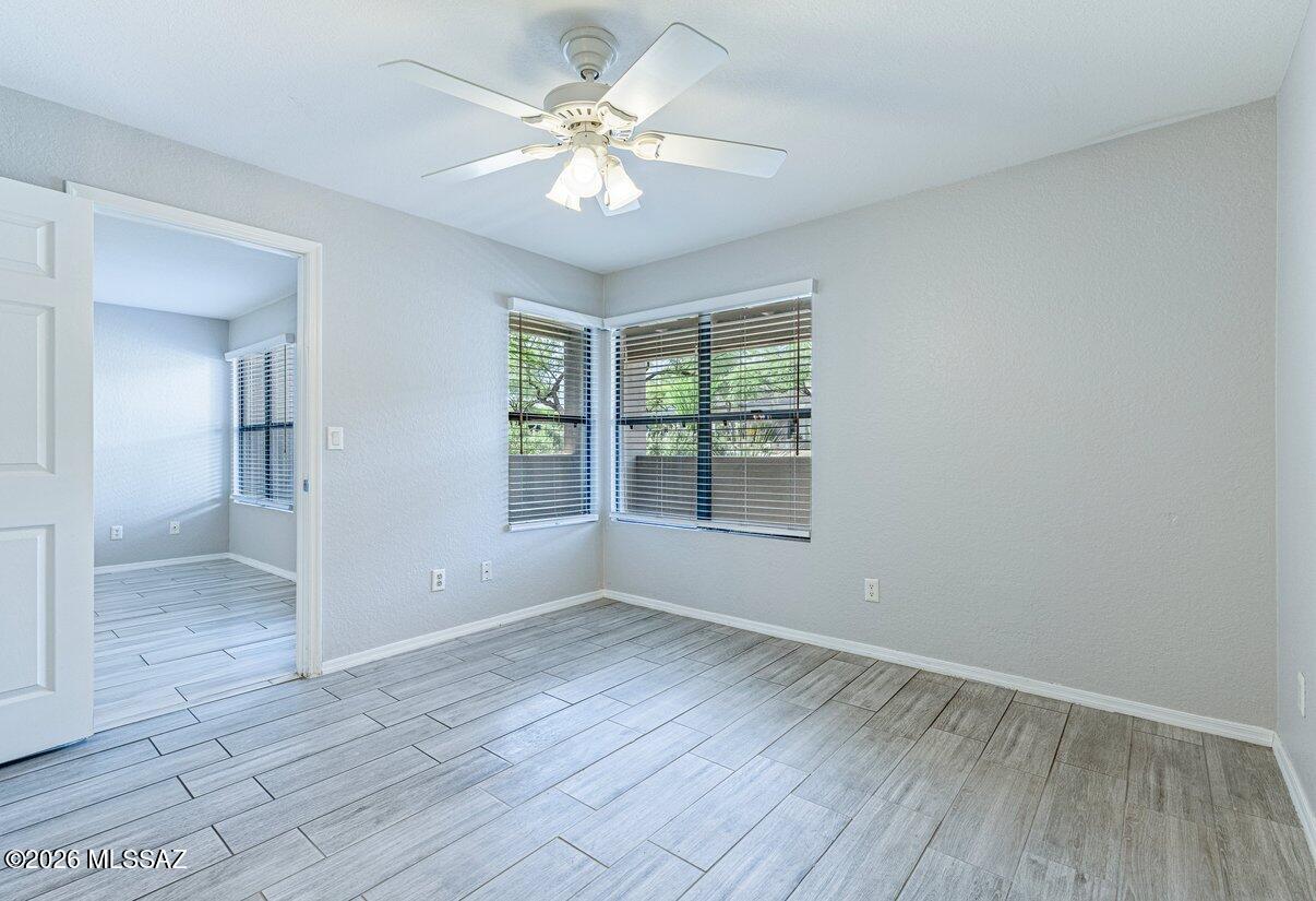 5800 North Kolb Road, Unit 1104 Tucson, AZ 85750 - Photo 9 of 29 Primary bedroom overlooking the rear patio.